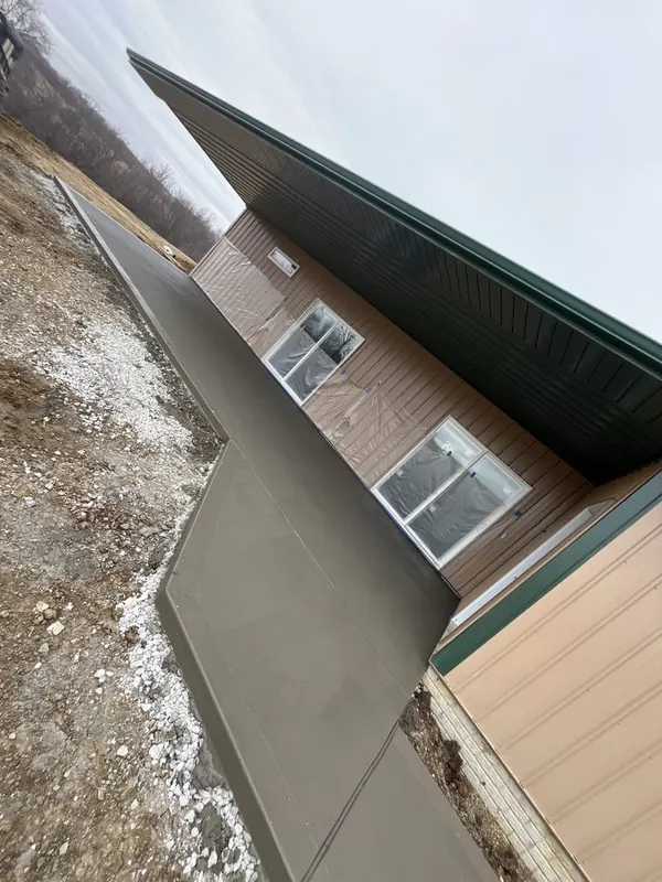 Concrete apron poured along the side of a pole barn, Medina Concrete job